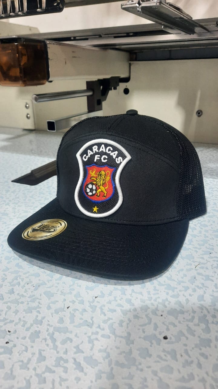 Stock de gorras corporativas en Venezuela
